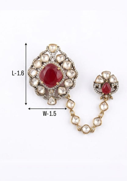 Royal Indian groom sherwani brooch featuring a cushion-cut red ruby surrounded.