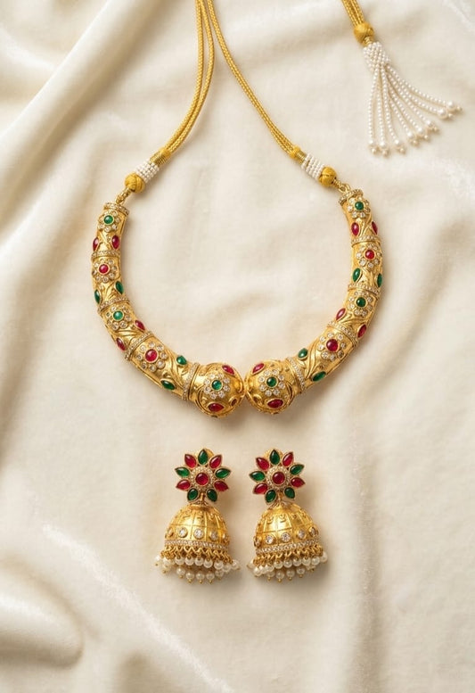 necklace set with ruby emerald stones and matching jhumka earrings
