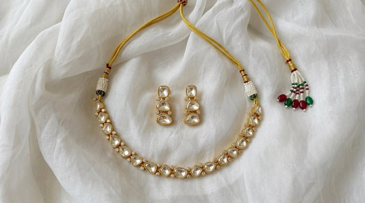 Kundan teardrop necklace set with matching ring.