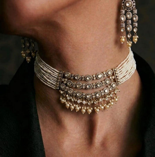 Multi strand pearl kundan choker necklace set, bridal statement jewellery for wedding wear online India.
